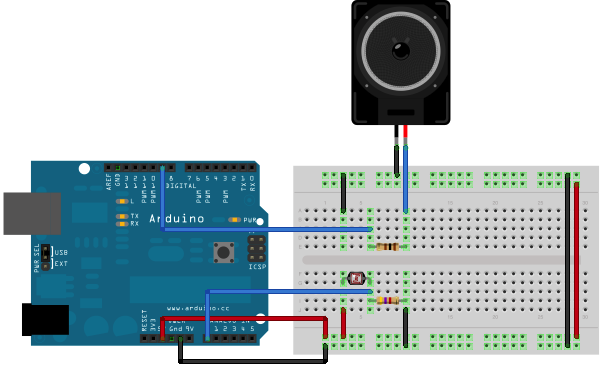 Рис. 1. Плата Arduino с подключенным пьезодинамиком и фоторезистором